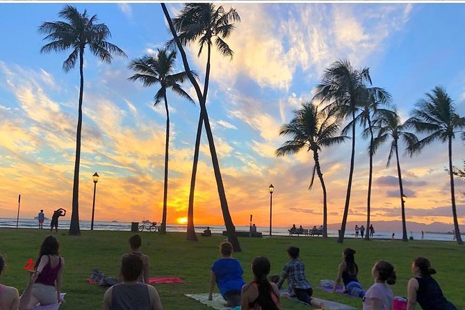 Beach Yoga on Waikiki with Diamondhead Backdrop - Choosing between a calm morning and a sunset flow