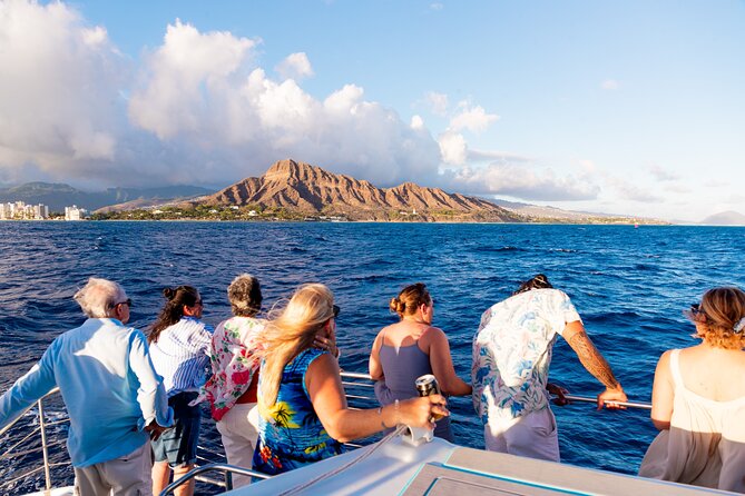 Board from Waikiki Beach for a scenic Sunset Sail on the Hāwea - Waikiki, Diamond Head, and the Open Pacific