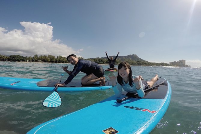 Family Stand Up Paddle Lesson with Waikiki Courtesy Shuttle - Starting with the yellow Surf School Bus