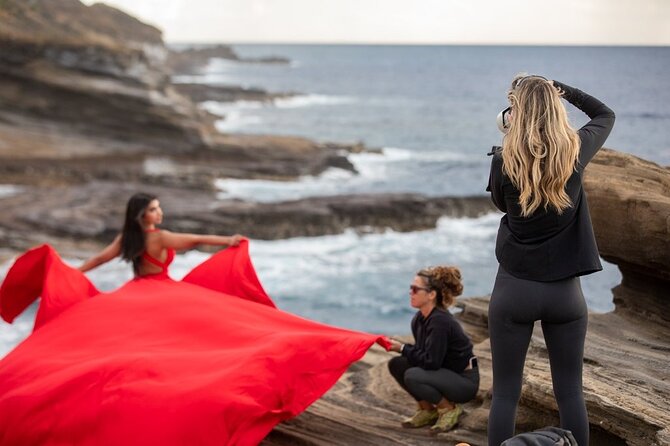 Flying Dress Photoshoot on Oahu - Walking across volcanic rock for better views