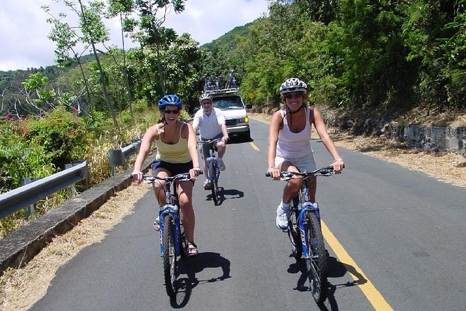 Full Day Oahu Bike, Hike, Sail and Snorkel Combo - Snorkeling above Pacific reefs