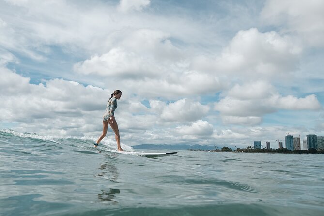Group Surf Lesson in Honolulu - Catching waves with Shane and Captain Neil