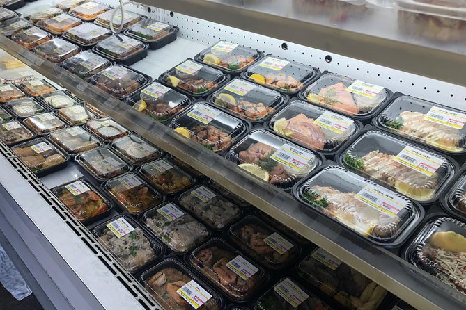 Hawaiian Food Tour by Bike in Oahu - Waikiki Surf Club, canoes, and the return ride
