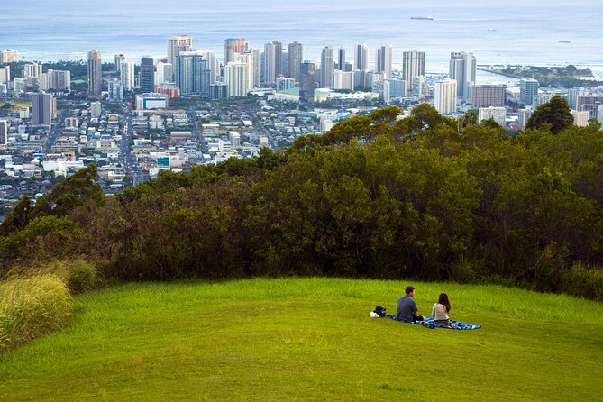Honolulu Rainforest Self-Guided Audio Tour - Punchbowl Crater connects scenery with remembrance