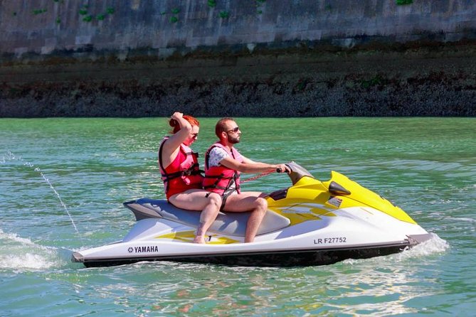 Jet Ski Ride Maunalua Bay. Tandem-2 people ride-price per person - The short boat trip to the floating platform