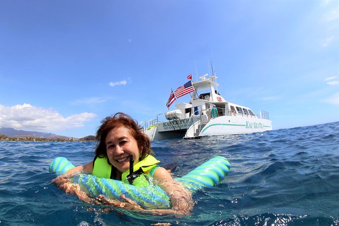 Luxury Snorkel Cruise, Local Buffet with Whale & Dolphin Watch - Boarding the 61-Foot Kai OliOli Catamaran