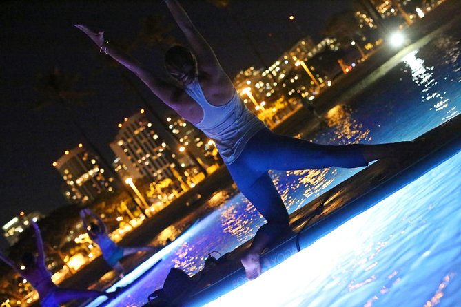 Night SUP Yoga in Honolulu, Hawaii - Starting at Magic Island After Dark