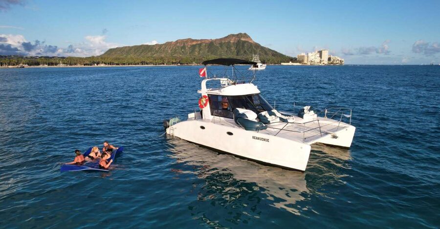Oahu: Private Catamaran Sunset Cruise & Optional Snorkeling - Sunset on the return to Kewalo Basin