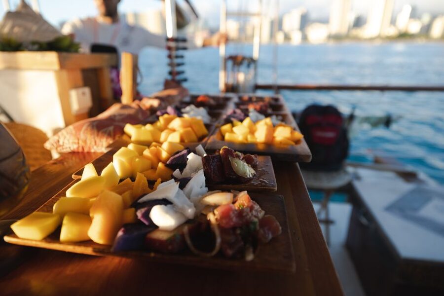 Oahu: Traditional Canoe Sunset Cruise with Dinner - Hawaiian stories, songs, and island history