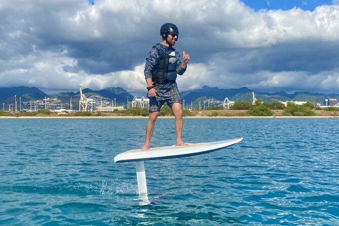 Premium eFoil Lesson near Waikiki - Learning turns, speed, and touch-and-go foiling