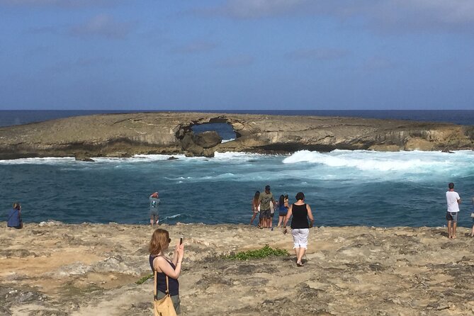 Private luxury tour of Oahu island - Chinaman’s Hat and Tropical Farms bring you toward the windward coast