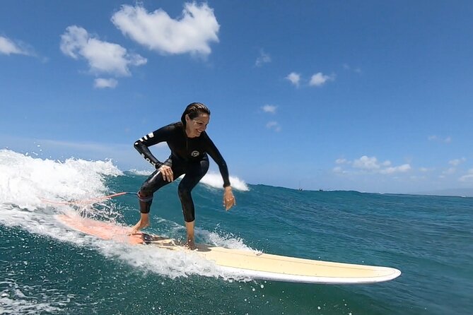 Private & Semi-Private Surf Lessons in Waikiki - Catching your first wave at Grays Beach