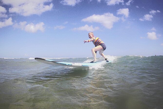 Private Surfing Lessons on the North Shore of Oahu - Entering the water and working toward the first ride