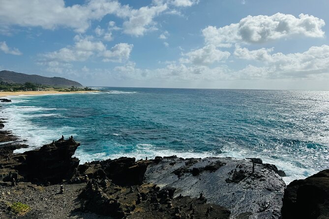 Scenic half day Circle Island tour - Halona Blowhole turns waves into a natural geyser