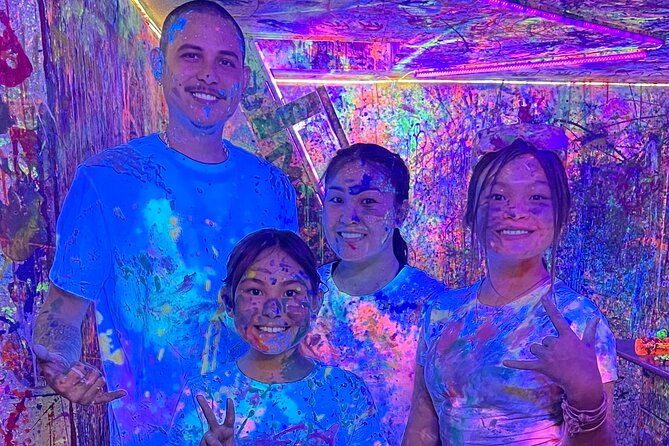 Splatter Art Paint Studio Experience in Hawaii - Adding the Optional Neon Splatter Guns