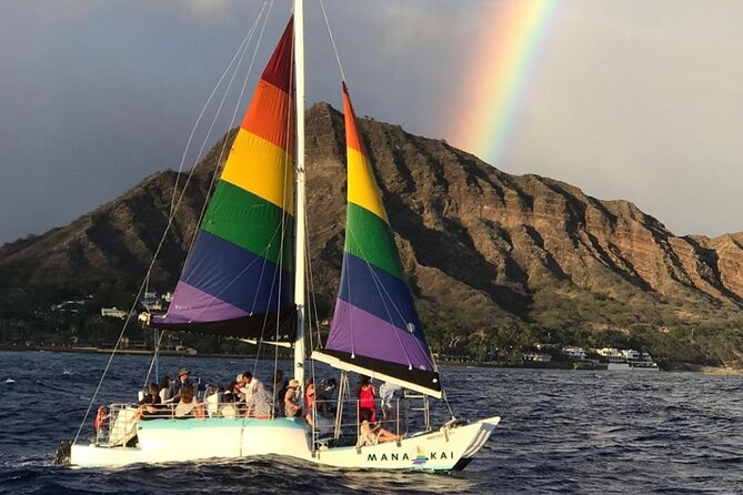 Sunset sail Aboard Manakai Catamaran - Following Diamond Head into the evening light