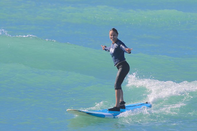 Surf HNL: Surf Lessons near Ko'olina!!!!! - Paddling out with an instructor beside you
