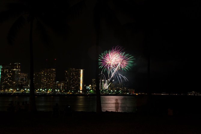 Waikiki Fireworks Dinner Cruise: Sail & Sparkle on Friday Nights - The Waikiki coastline after sunset