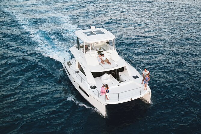Waikiki's Premier Small Group Sunset Yacht + Tasting - Watching the water for Hawaiian wildlife