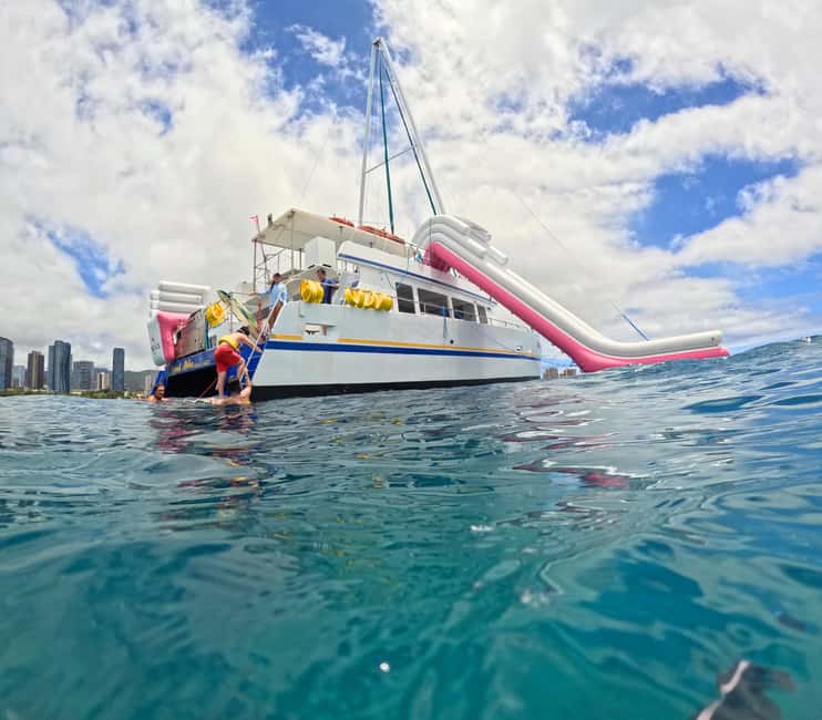 Waikiki: Snorkeling & Ocean Playground Experience - The slide, platform, and floating mat