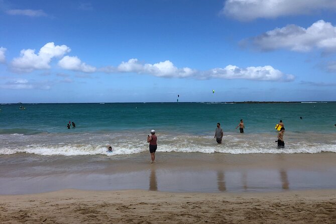 Waterfall Hike , Sightseeing & East Side Beach Day - The value of a guide on wet ground